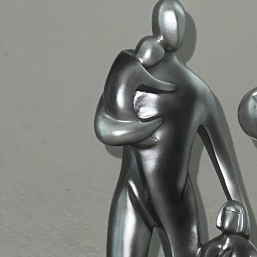 Decorative Sculpture - “Adult & 2 Children”